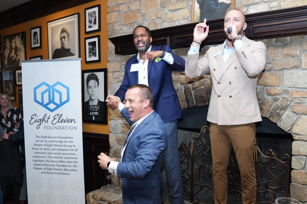 (2023): Nate and Fred Yeakey, Chief Partnership Officer – Providence Cristo Rey High School, act as Eight Eleven Foundation’s auctioneer at the annual fundraiser and charity auction.